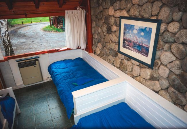 Comodas camas simples BOG Río Bonito Villa La Angostura