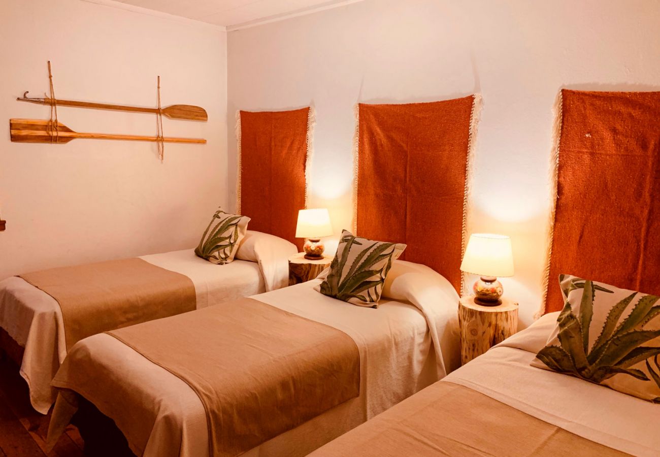 Dormitorio con camas simples BOG Pichi Ruca Villa La Angostura