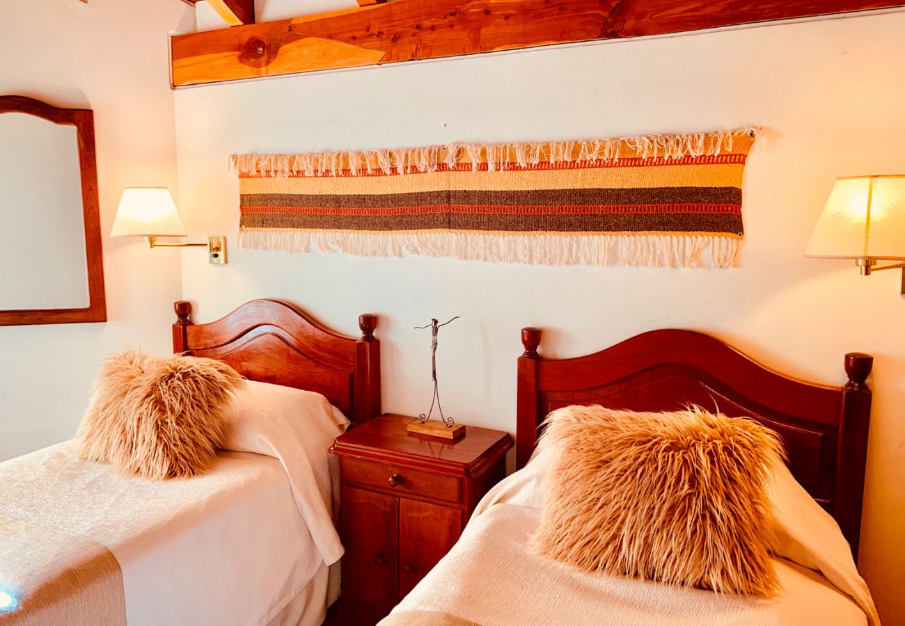 Dormitorio con camas individuales BOG Pichi Ruca Villa La Angostura